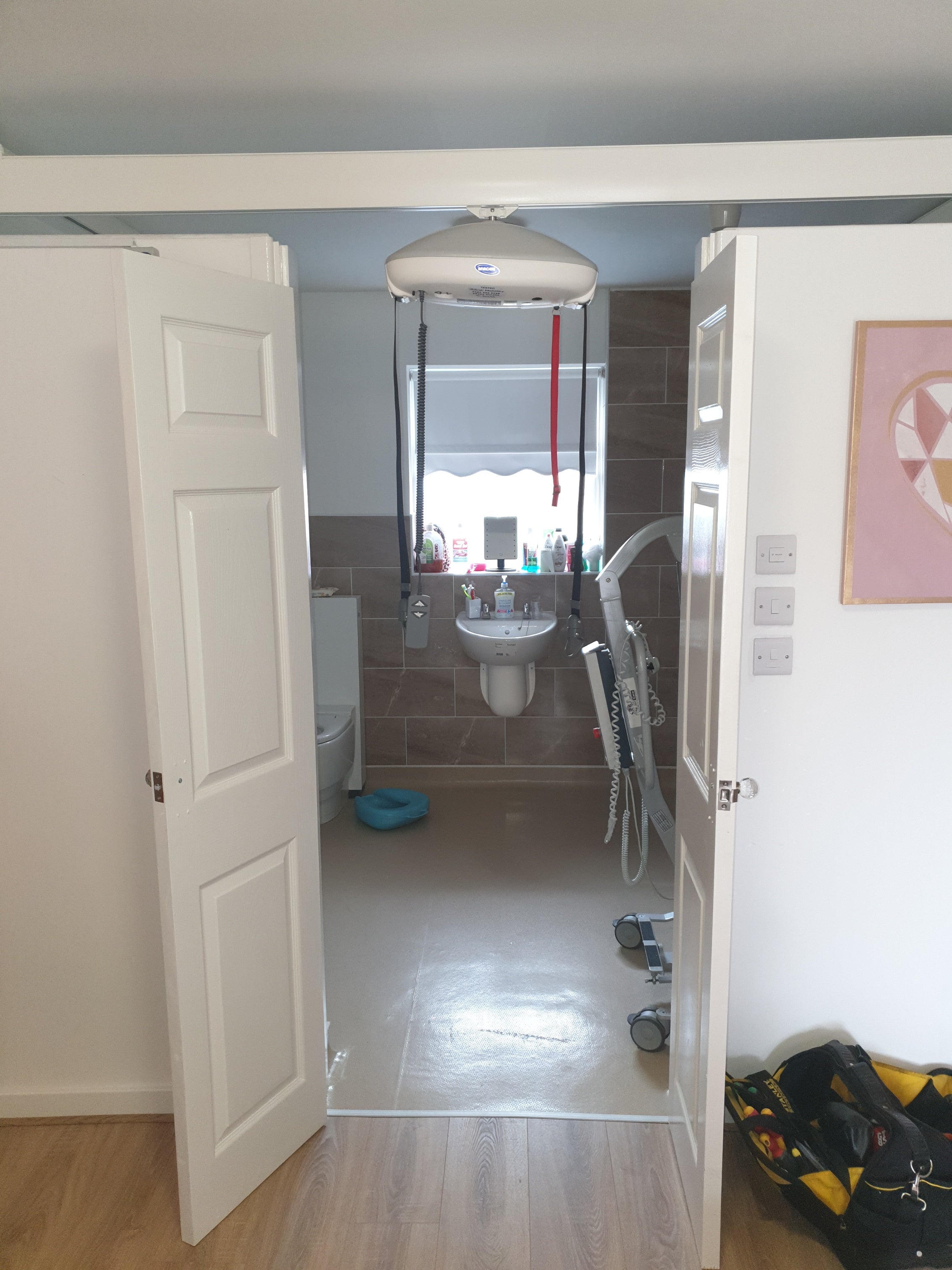 Invacare Robin room to room ceiling hoist X-Y system Liverpool.