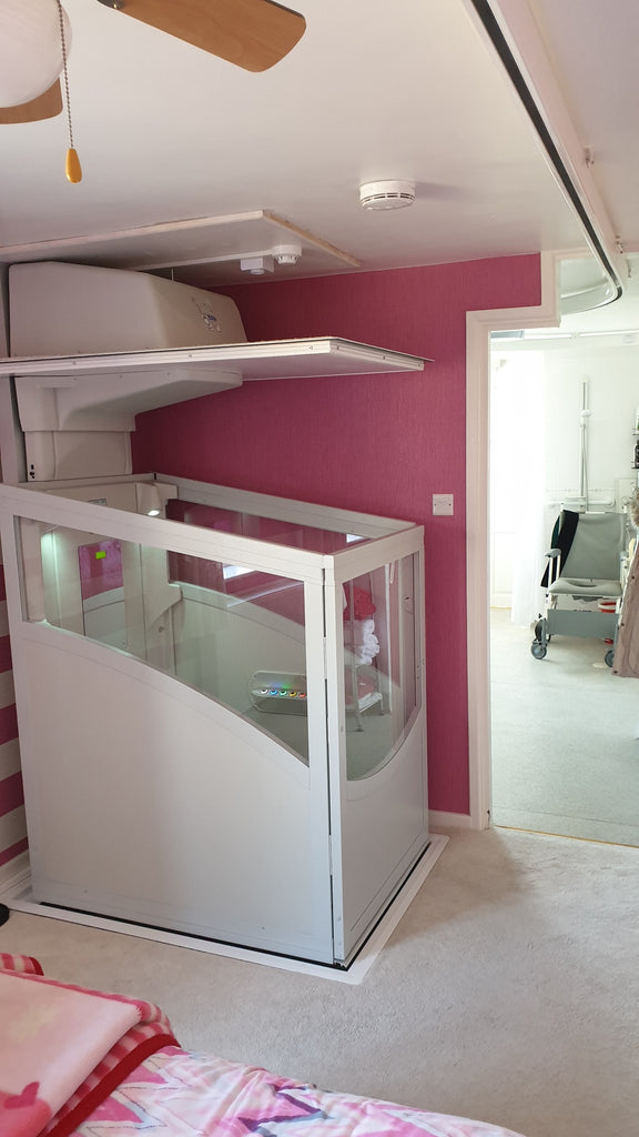Pollock Vertical through floor lift installed in Bolton, Greater Manchester