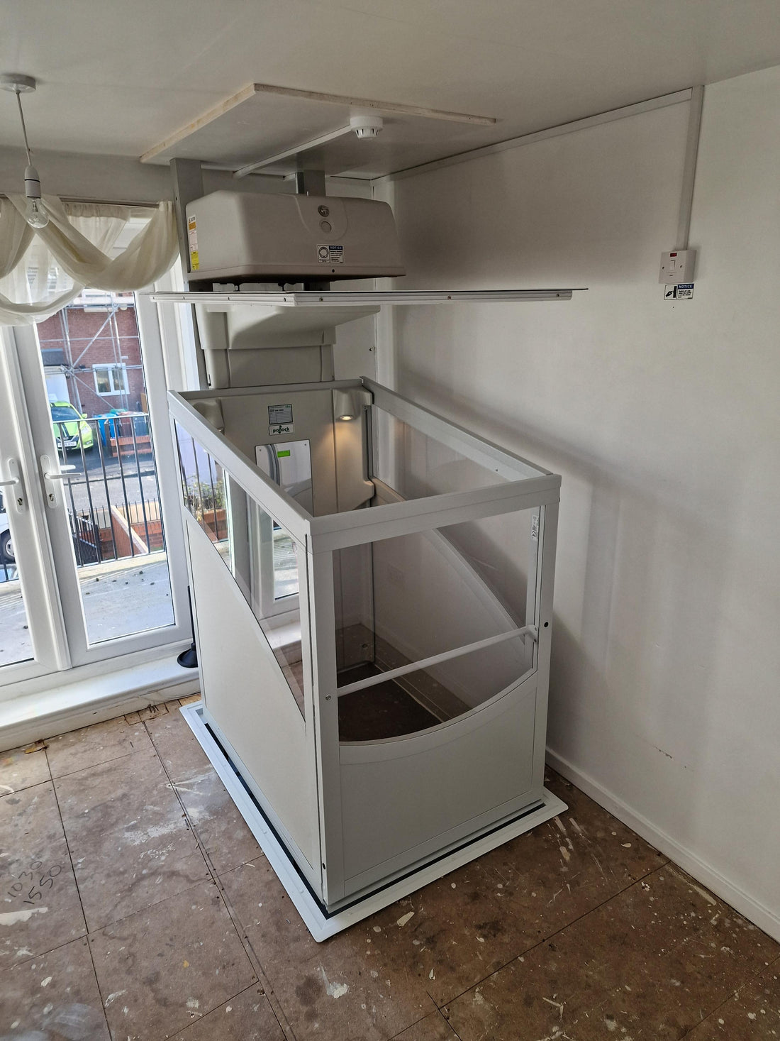 Full New Installation of Pollock Through floor Vertical home lift for customer in Manchester M13