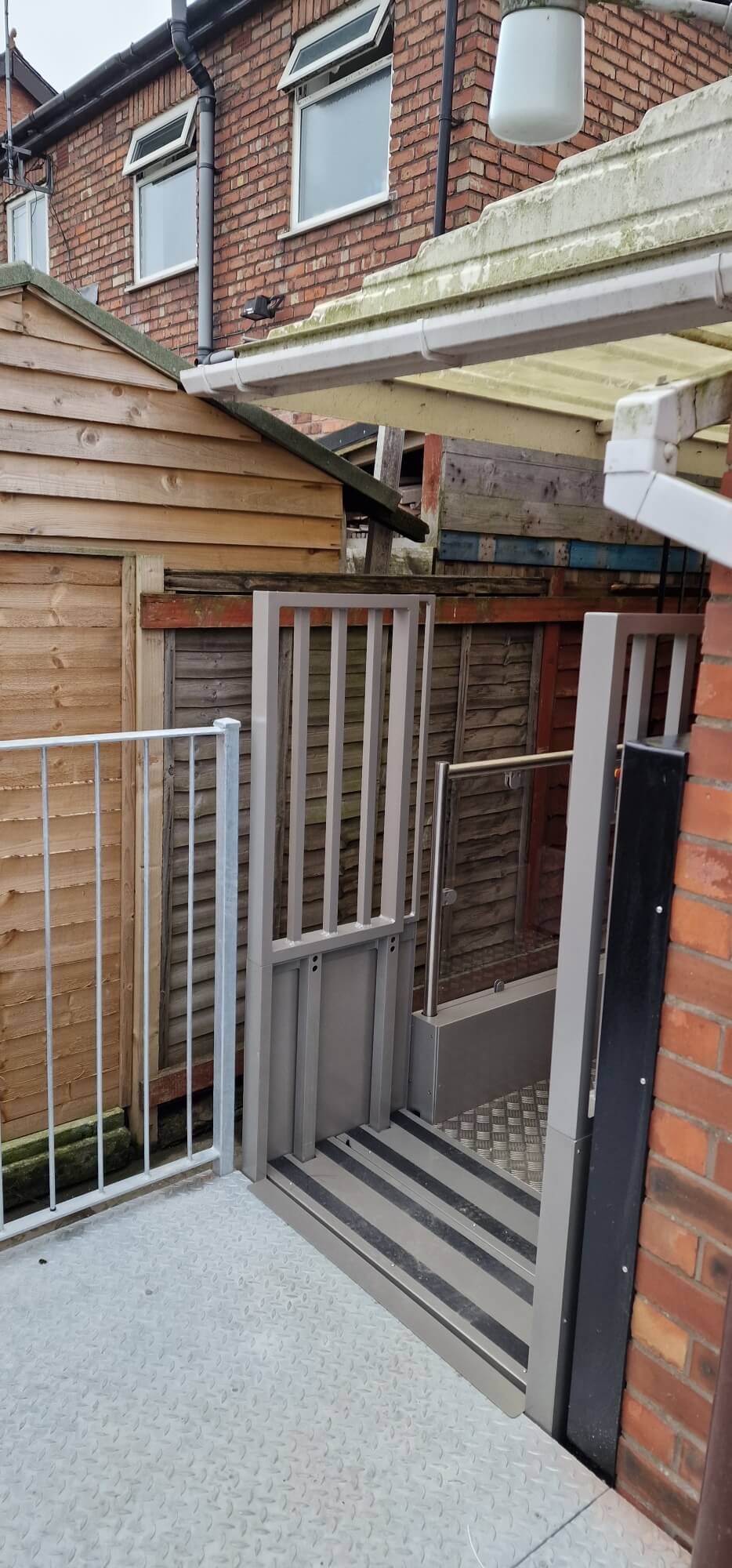 Installation of an outside Pollock steplift for Manchester Council In Back Garden/Rear Access