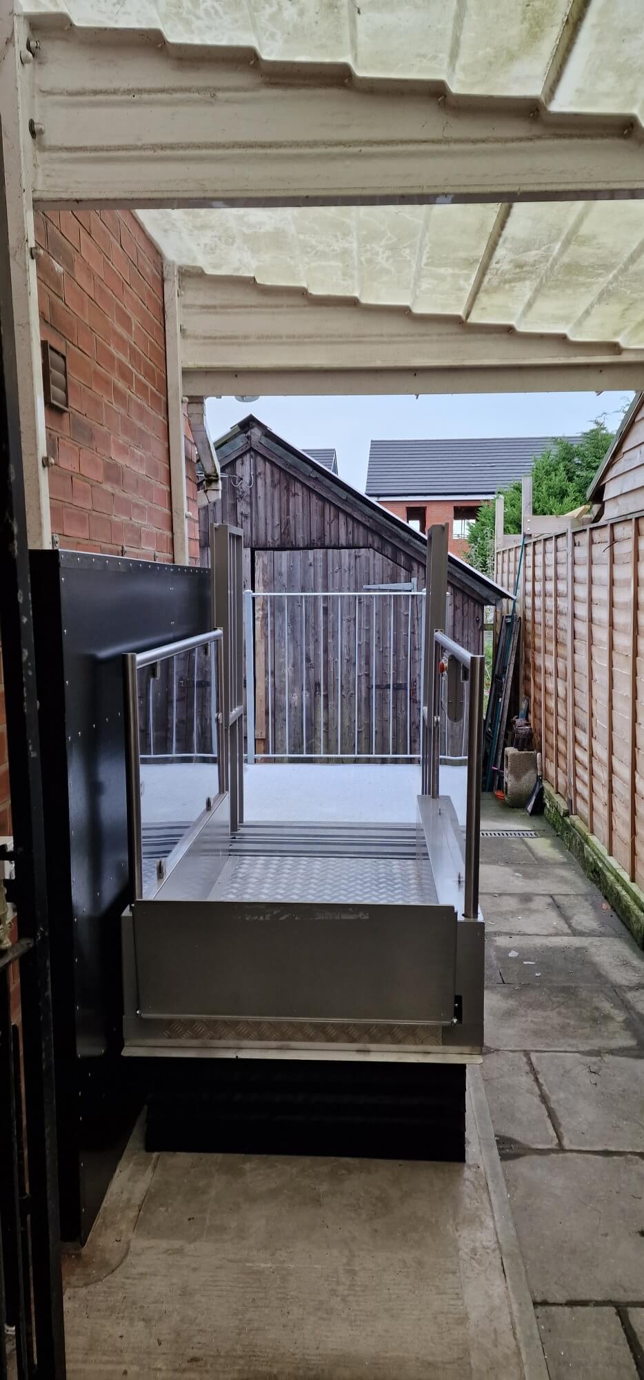 Installation of an outside Pollock steplift for Manchester Council In Back Garden/Rear Access