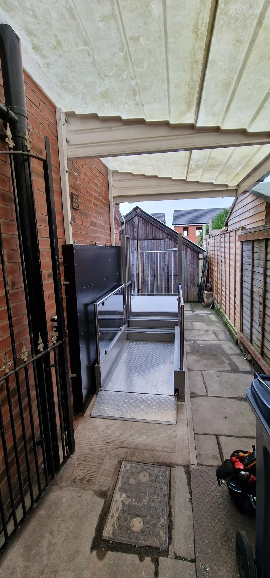 Installation of an outside Pollock steplift for Manchester Council In Back Garden/Rear Access