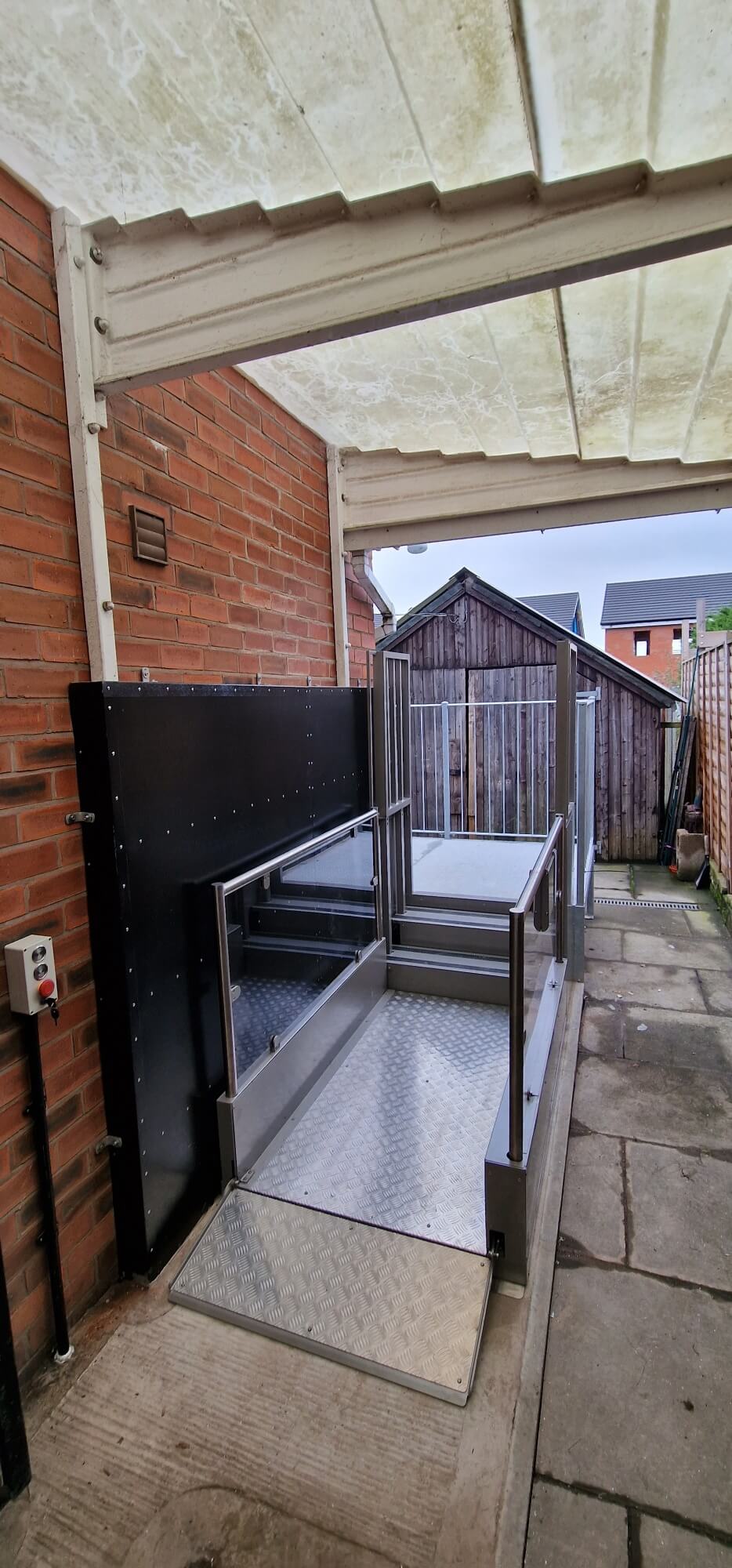 Installation of an outside Pollock steplift for Manchester Council In Back Garden/Rear Access