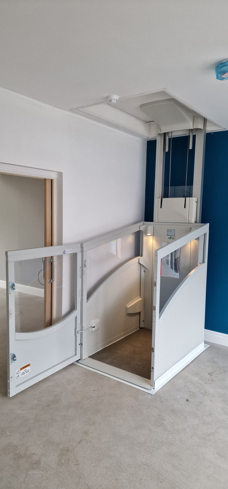 Installation of a New Pollock Vertical Through Floor Lift Manchester Council