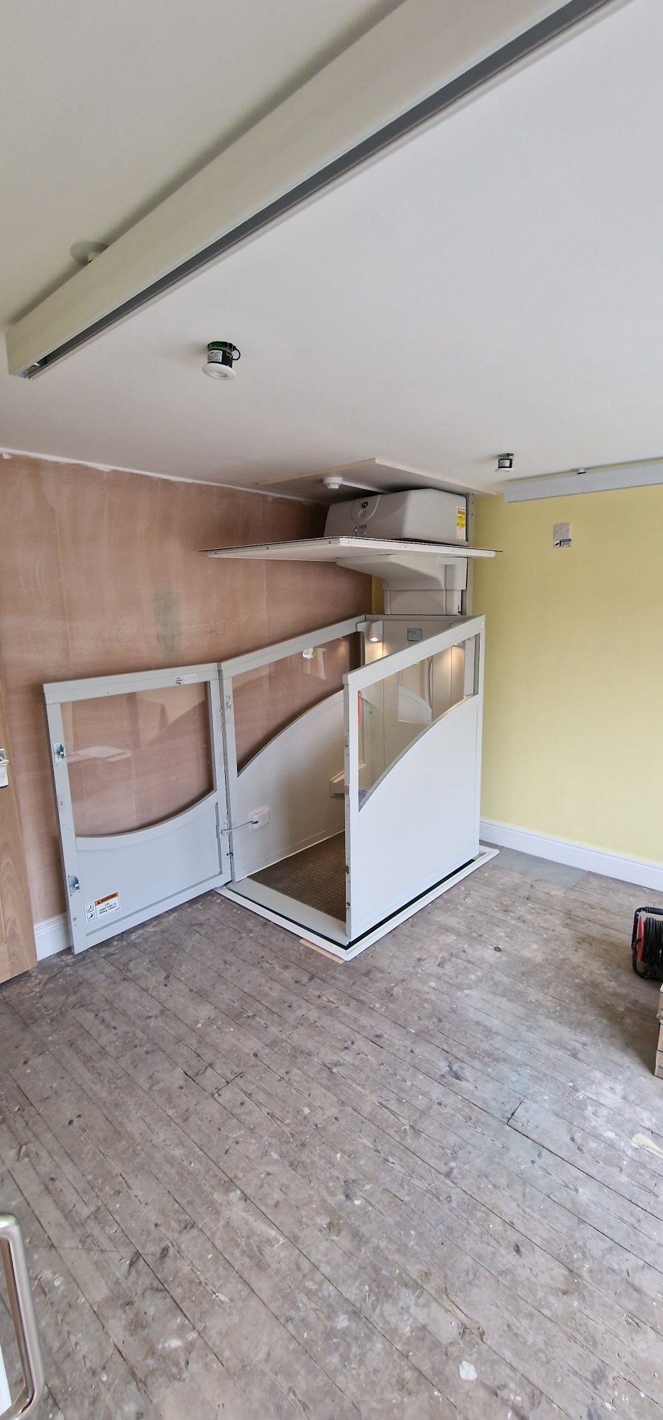 Installation of a New Pollock Vertical Through Floor Lift Manchester Council