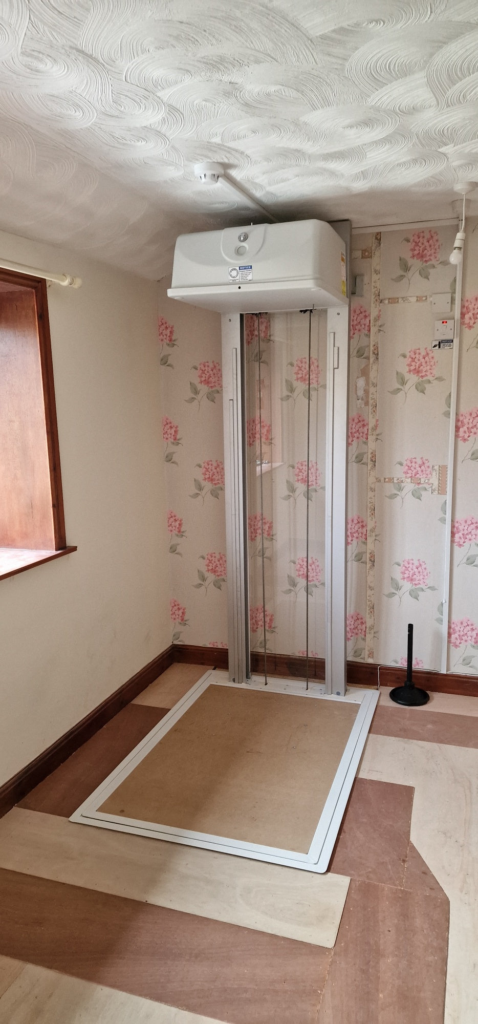 Installation of a New Pollock Vertical Through Floor Lift Manchester Council