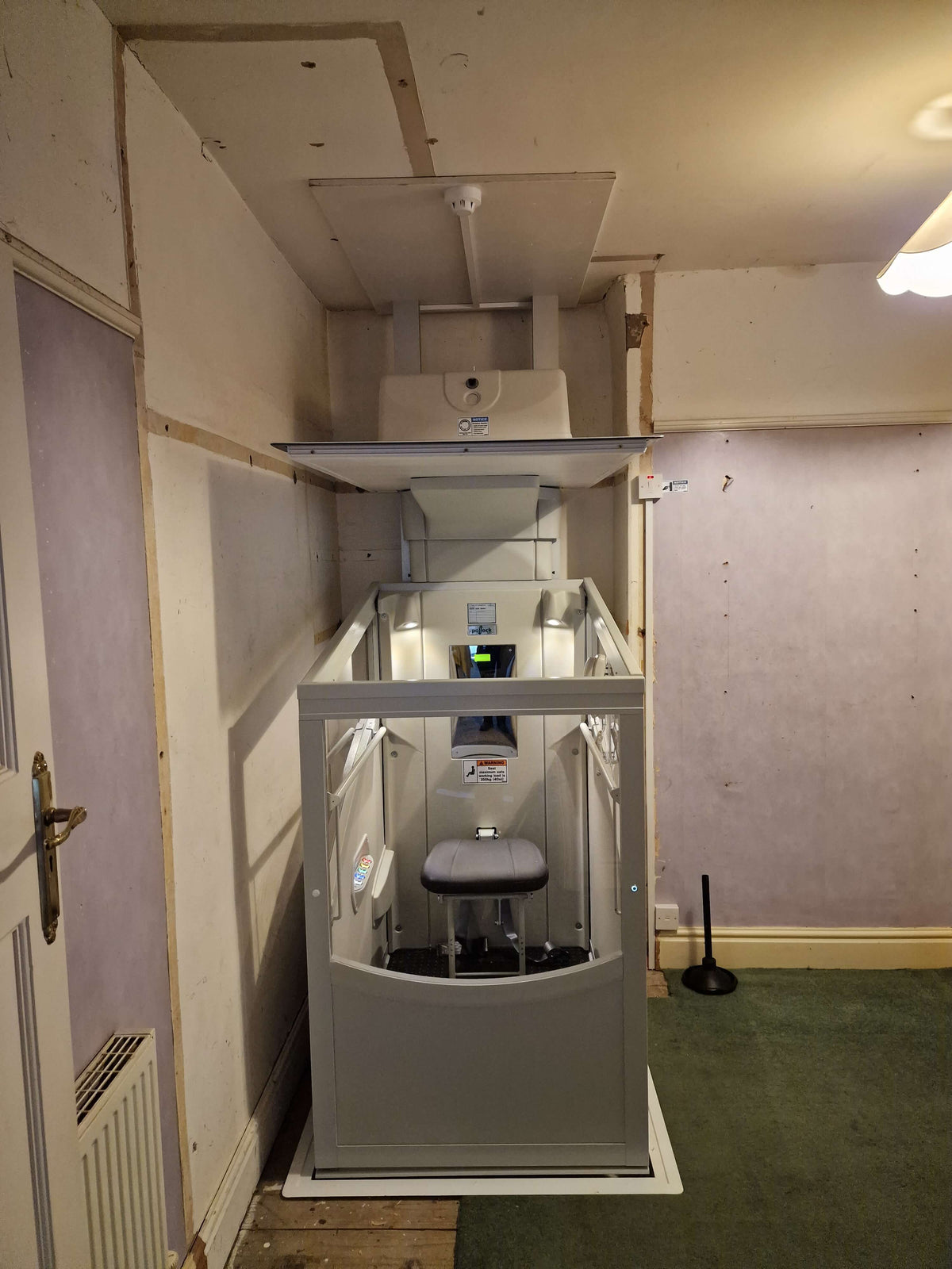 Installation of Pollock Vertical Through Floor Home Lift for Knowsley Council
