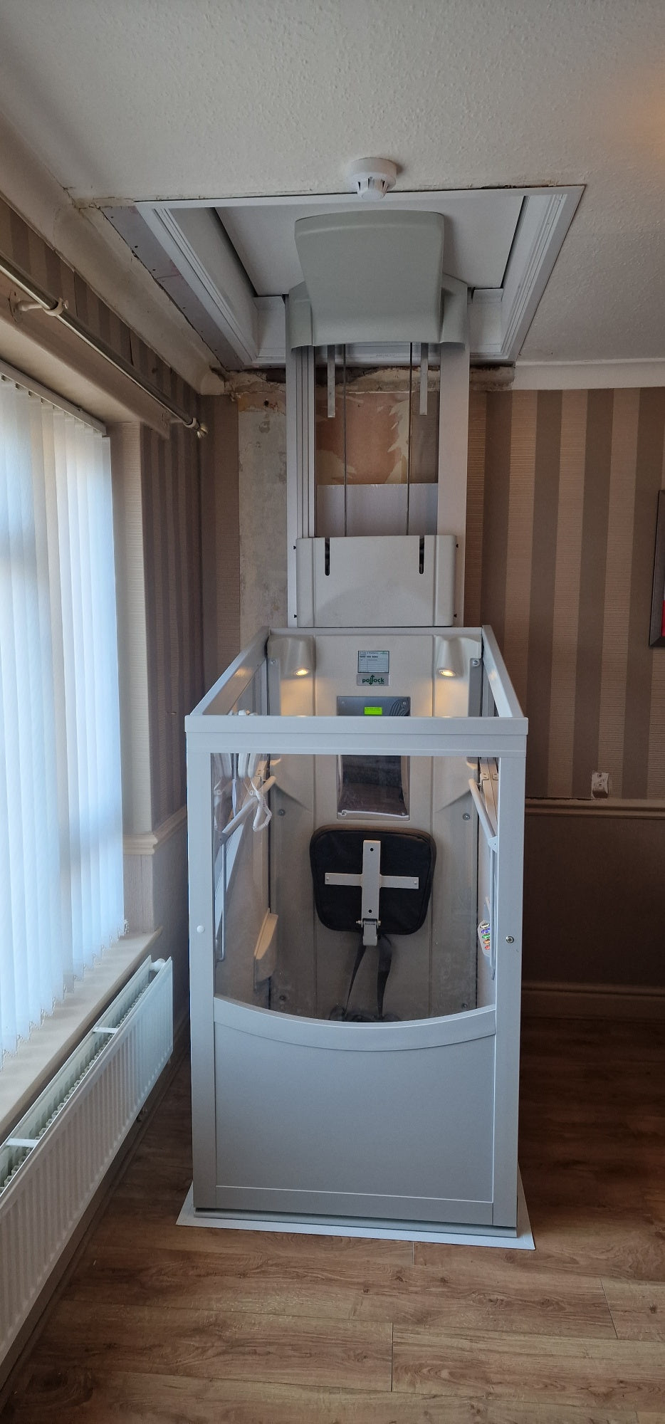Installation of a New Pollock Vertical Through Floor Lift Manchester Council