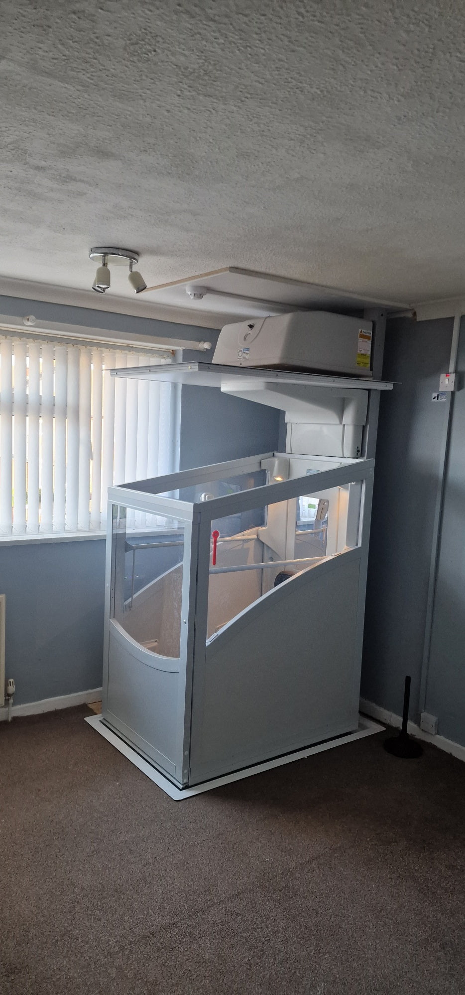 Installation of a New Pollock Vertical Through Floor Lift Manchester Council