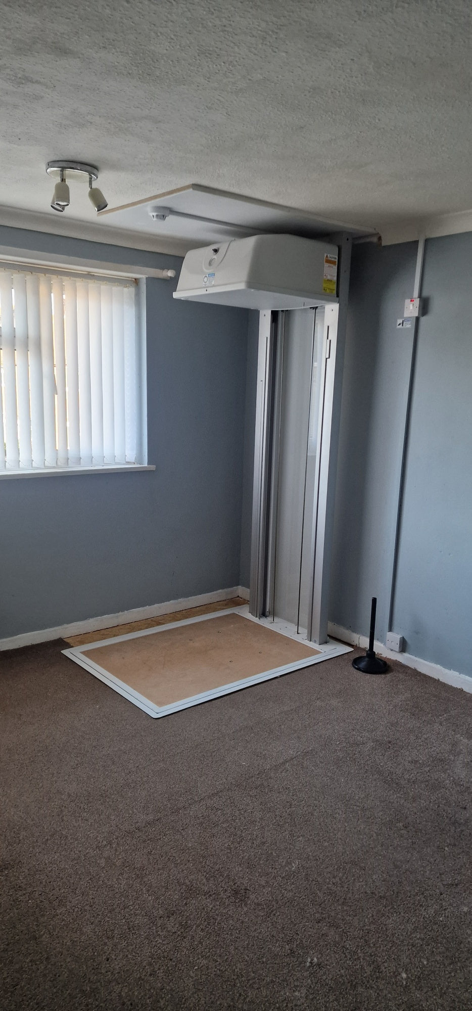 Installation of a New Pollock Vertical Through Floor Lift Manchester Council