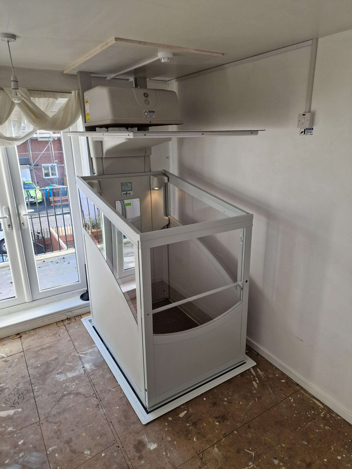 Installation of a Pollock Through Floor Vertical Lift Manchester M13 