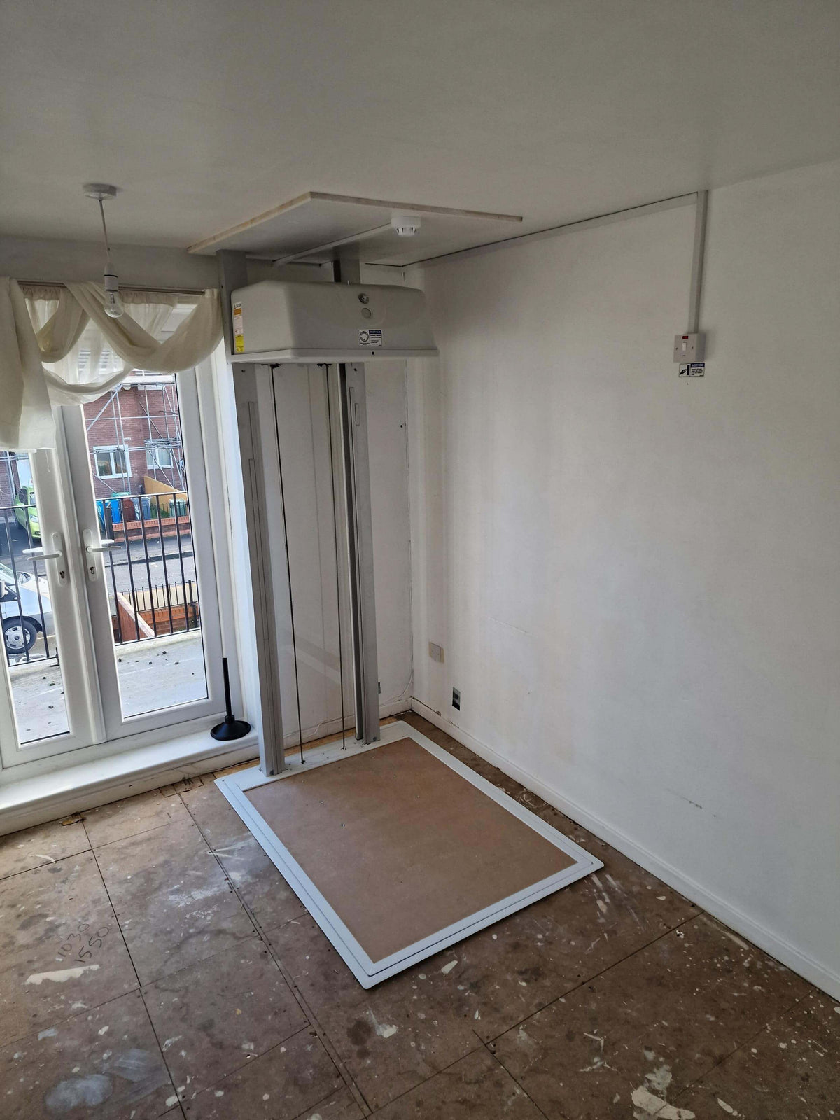 Installation of a Pollock Through Floor Vertical Lift Manchester M13 